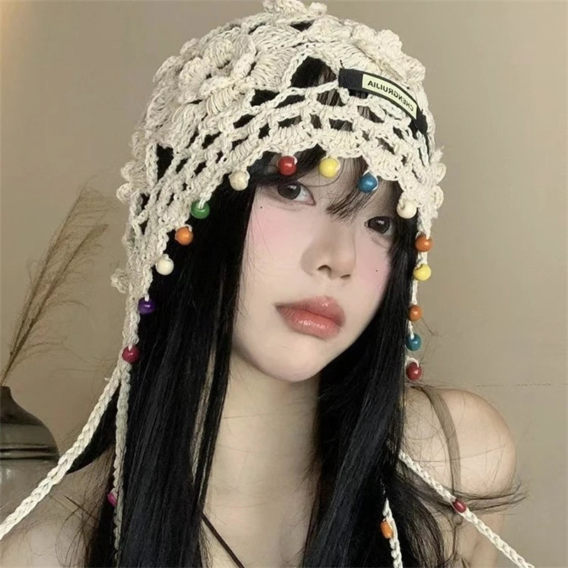 Bohemian tassel hand-knitted toe hat women's ethnic style vacation INS special beanies sweet cut-out versatile pullover hat
