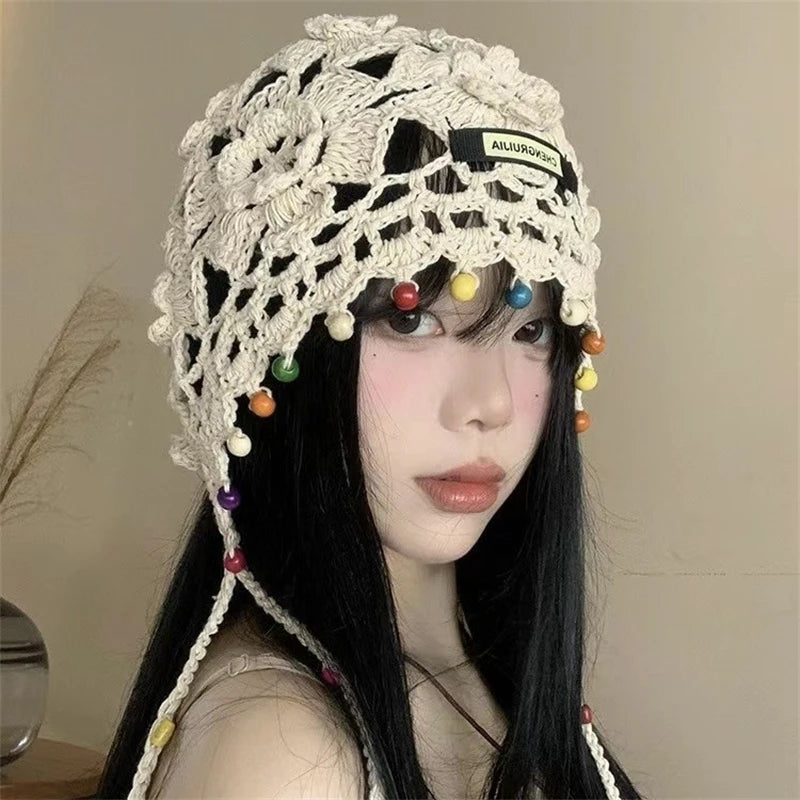 Bohemian tassel hand-knitted toe hat women's ethnic style vacation INS special beanies sweet cut-out versatile pullover hat
