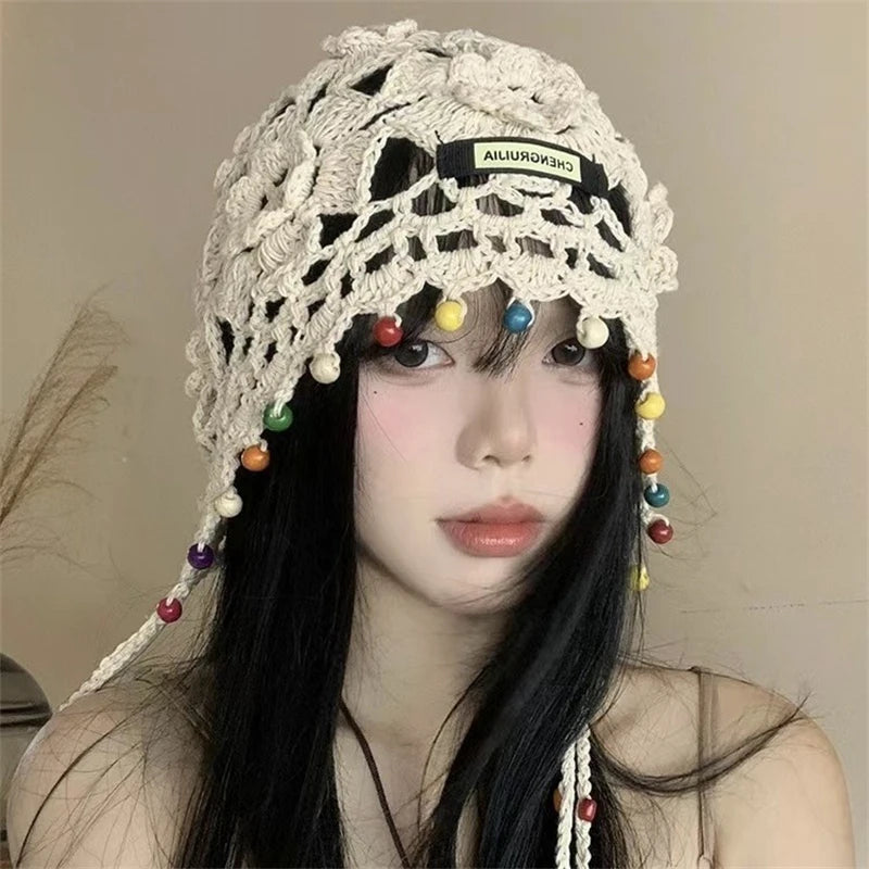 Bohemian tassel hand-knitted toe hat women's ethnic style vacation INS special beanies sweet cut-out versatile pullover hat