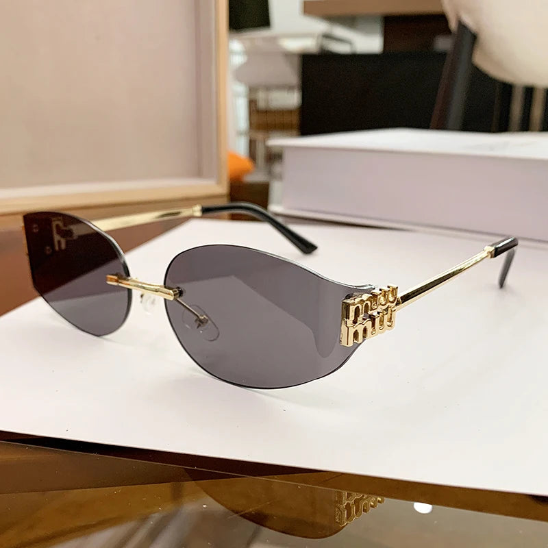 Oversized Rimless Oval Sunglasses – UV400 Metal Frame