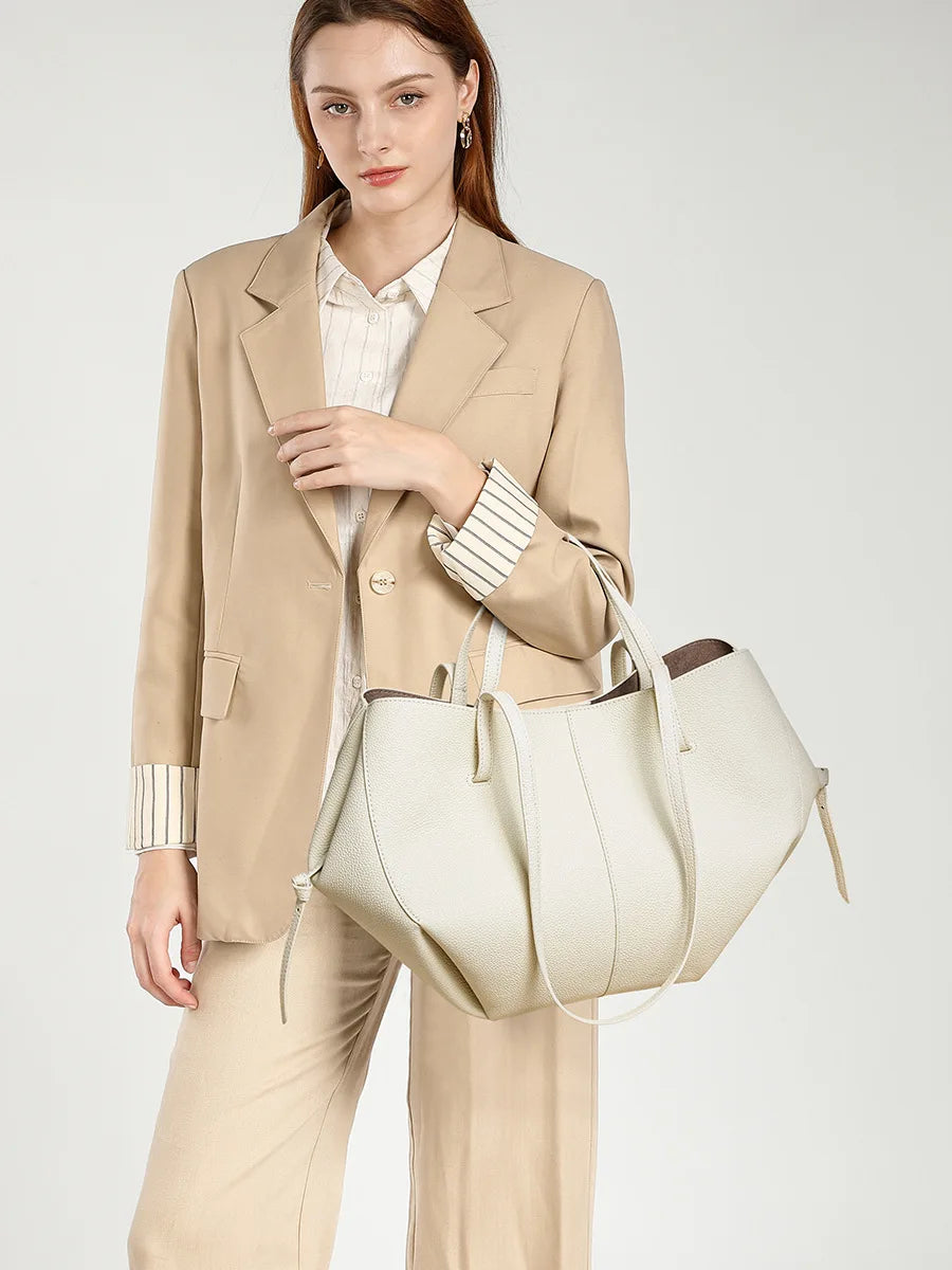 2025 leather shoulder bag versatile niche handbag, top layer cowhide commuting high-end feeling, large capacity tote bag for wom