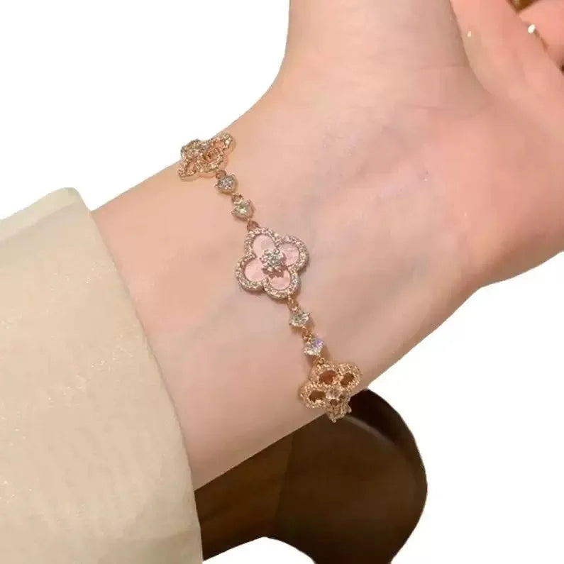 GLOSSMOON Sakura Cleef Bracelet Fashionable and Elegant Cherry Blossom Bracelet Does Not Change Color and Is Not Allergic  The Sakura Clover Bracelet showcases a multitude of brilliant diamonds, forming a luminous sparkle tha