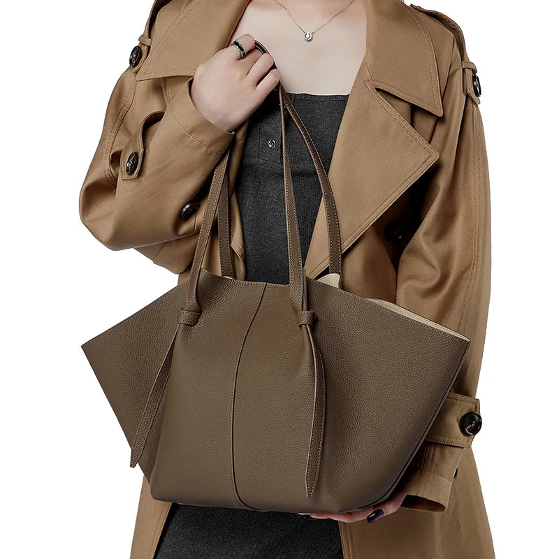 New Women's Large Capacity Cowhide Tote Fashionable Bat Wing Design Genuine Leather Handbag for Commuting Versatile Ladies Bag