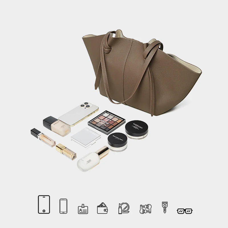 New Women's Large Capacity Cowhide Tote Fashionable Bat Wing Design Genuine Leather Handbag for Commuting Versatile Ladies Bag