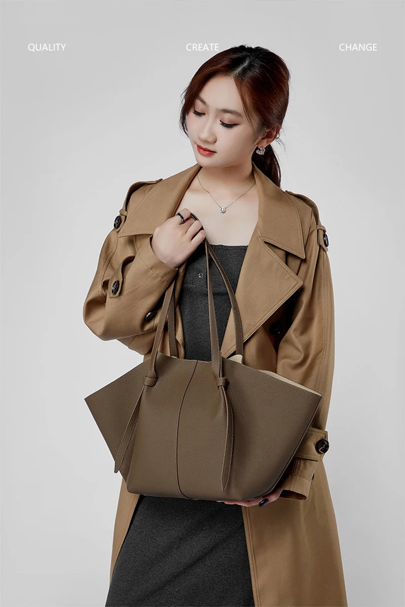New Women's Large Capacity Cowhide Tote Fashionable Bat Wing Design Genuine Leather Handbag for Commuting Versatile Ladies Bag