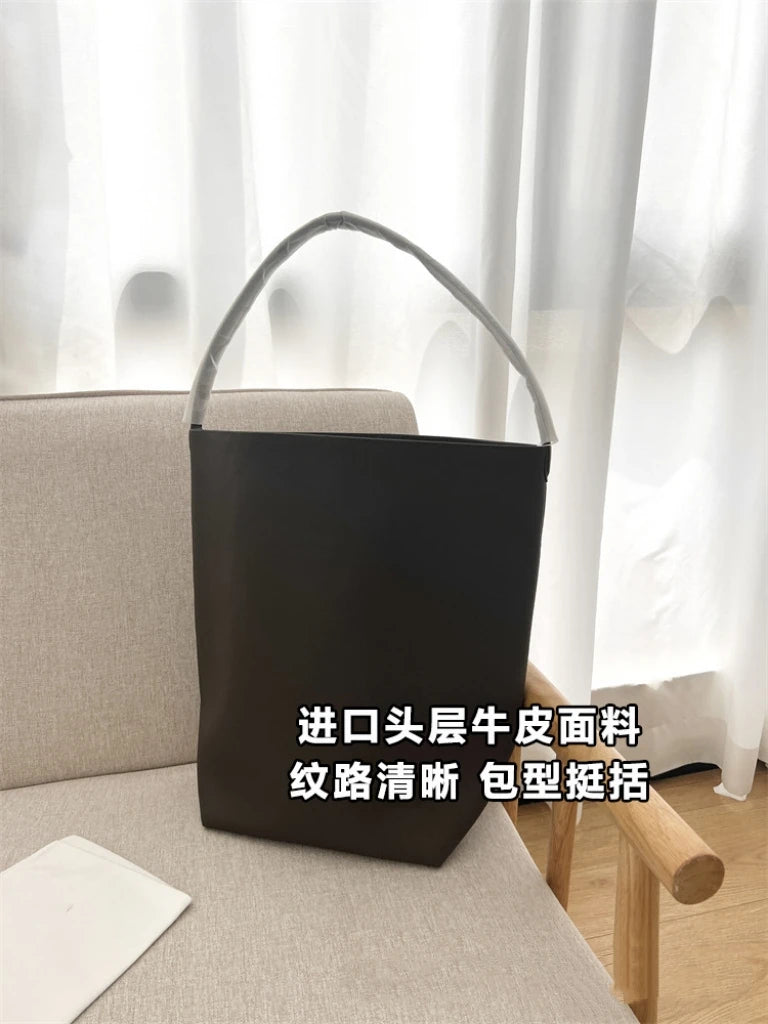 25 year new cowhide lychee pattern single shoulder commuting versatile large capacity bucket bag