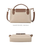 Fashionable and trendy one-shoulder bag, retro crossbody bag, simple and elegant small square bag for women.