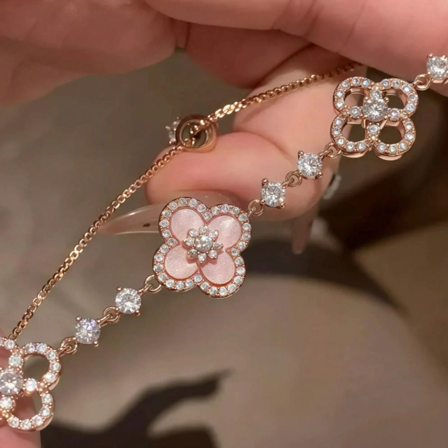 GLOSSMOON Sakura Cleef Bracelet Fashionable and Elegant Cherry Blossom Bracelet Does Not Change Color and Is Not Allergic  The Sakura Clover Bracelet showcases a multitude of brilliant diamonds, forming a luminous sparkle tha