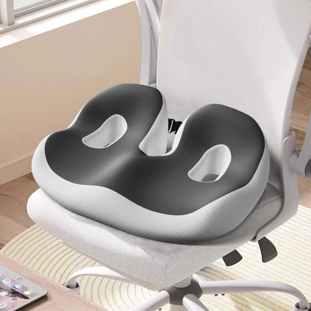 Pressure-resistant and breathable ergonomic seat cushion with slow-recovery filling and curved surface fitting the hips
