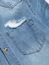Men's summer blue short - sleeved denim shirt with ripped details. The ripped design elements showcase a trendy and casual style