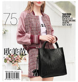 Fashionable and luxurious woven pattern casual versatile black woven pattern daily commuting cowhide women's handbag