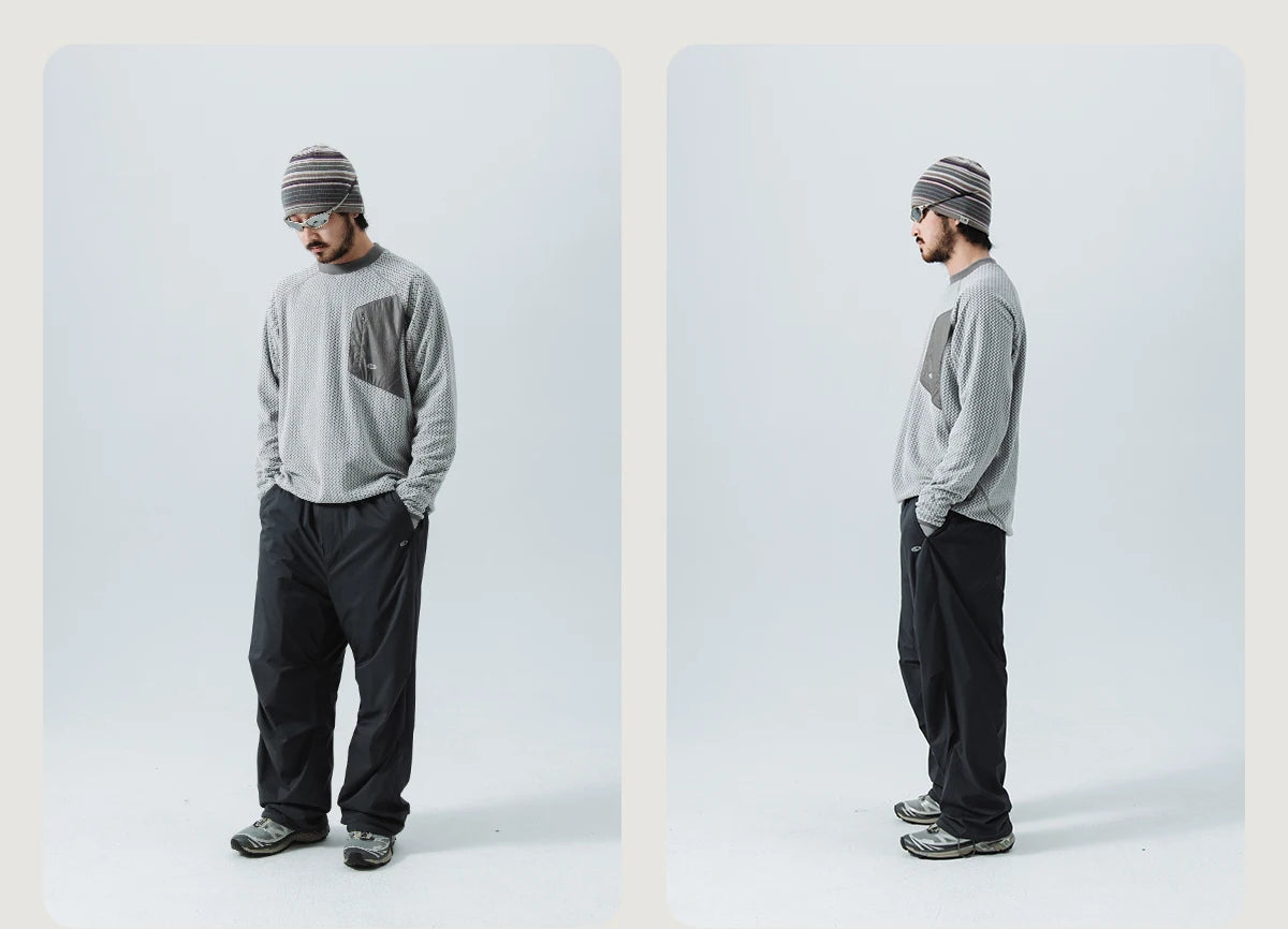 Mountain-Ready Crewneck: Engineered with Ribbed Neck, Reflective Logo, & Secure Chest Pocket for Outdoor Style Unisex