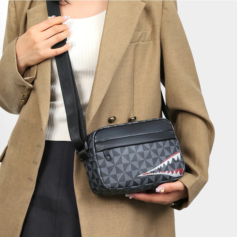 Neutral Style Backpack for Men and Women, with a Cross-Body Design, Suitable for Travel Photography. Features Shark Tooth Print.