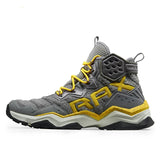 Gray and yellow hiking boot with RAX branding on a white background