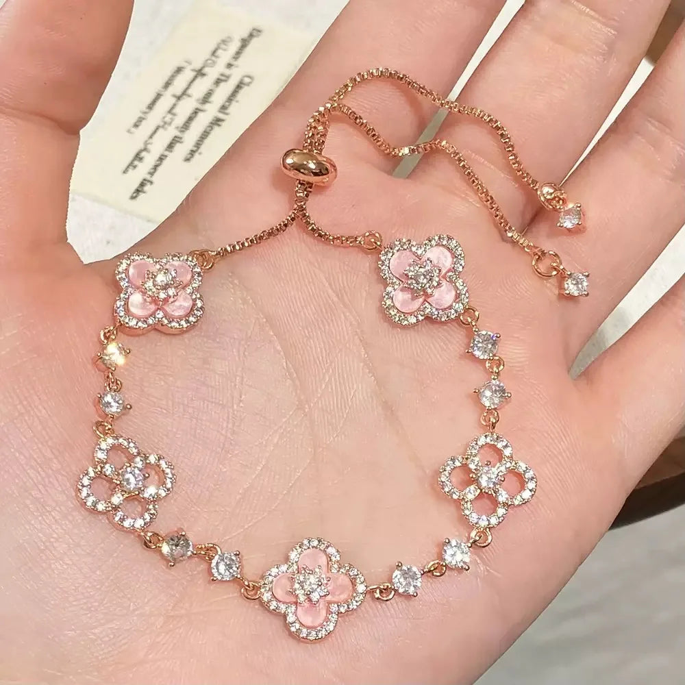 GLOSSMOON Sakura Cleef Bracelet Fashionable and Elegant Cherry Blossom Bracelet Does Not Change Color and Is Not Allergic  The Sakura Clover Bracelet showcases a multitude of brilliant diamonds, forming a luminous sparkle tha