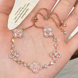 GLOSSMOON Sakura Cleef Bracelet Fashionable and Elegant Cherry Blossom Bracelet Does Not Change Color and Is Not Allergic  The Sakura Clover Bracelet showcases a multitude of brilliant diamonds, forming a luminous sparkle tha