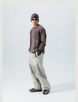Mountain-Ready Crewneck: Engineered with Ribbed Neck, Reflective Logo, & Secure Chest Pocket for Outdoor Style Unisex