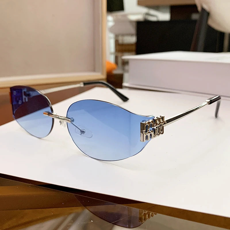 Oversized Rimless Oval Sunglasses – UV400 Metal Frame