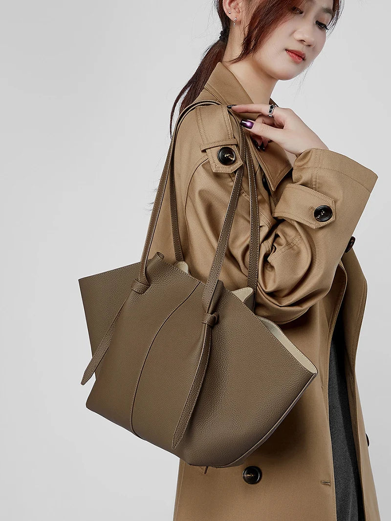 New Women's Large Capacity Cowhide Tote Fashionable Bat Wing Design Genuine Leather Handbag for Commuting Versatile Ladies Bag