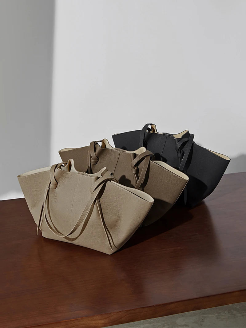 New Women's Large Capacity Cowhide Tote Fashionable Bat Wing Design Genuine Leather Handbag for Commuting Versatile Ladies Bag
