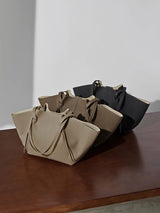 New Women's Large Capacity Cowhide Tote Fashionable Bat Wing Design Genuine Leather Handbag for Commuting Versatile Ladies Bag