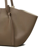 New Women's Large Capacity Cowhide Tote Fashionable Bat Wing Design Genuine Leather Handbag for Commuting Versatile Ladies Bag