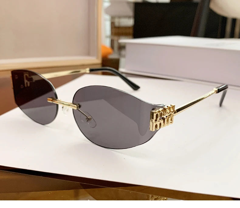 Oversized Rimless Oval Sunglasses – UV400 Metal Frame