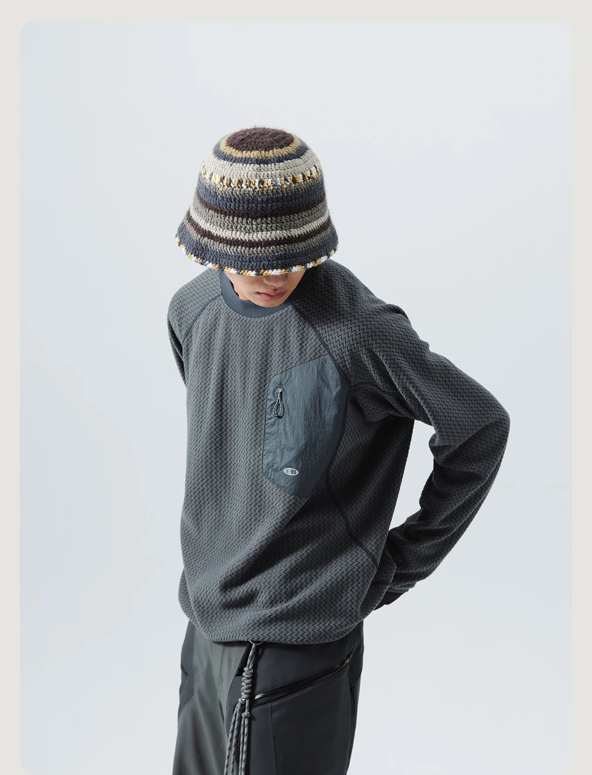 Mountain-Ready Crewneck: Engineered with Ribbed Neck, Reflective Logo, & Secure Chest Pocket for Outdoor Style Unisex