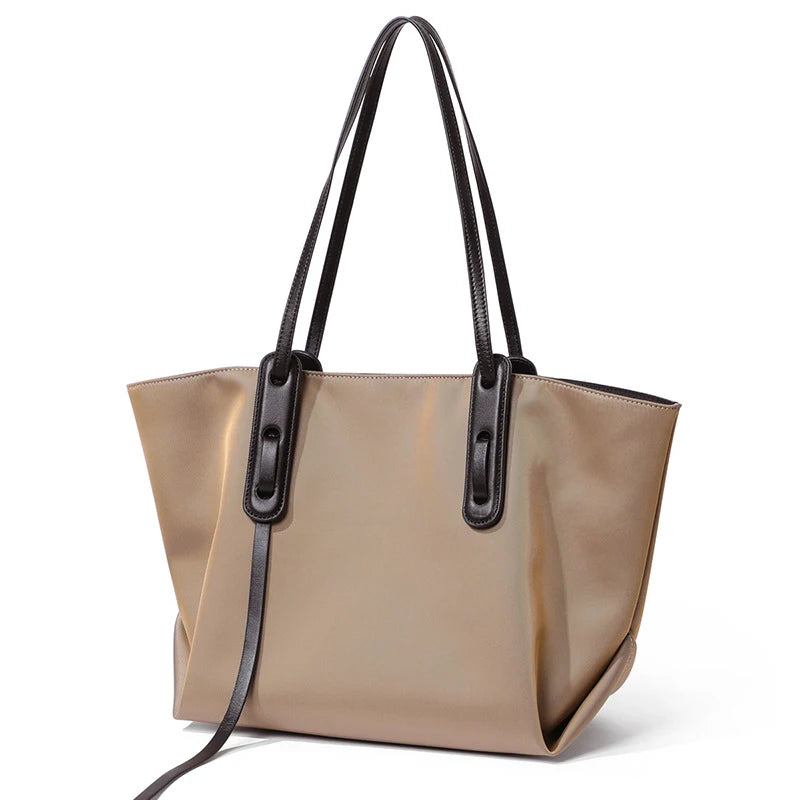 New Women's Large Capacity Cowhide Tote Fashionable Bat Wing Design Genuine Leather Handbag for Commuting Versatile Ladies Bag