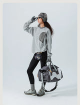 Mountain-Ready Crewneck: Engineered with Ribbed Neck, Reflective Logo, & Secure Chest Pocket for Outdoor Style Unisex