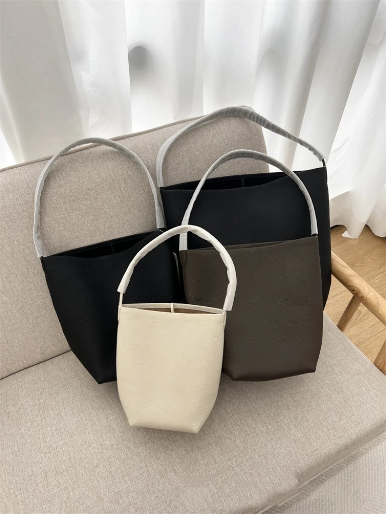 25 year new cowhide lychee pattern single shoulder commuting versatile large capacity bucket bag