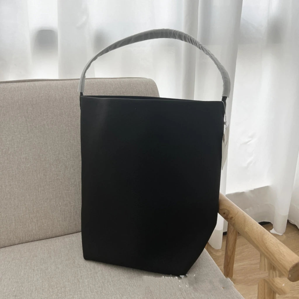25 year new cowhide lychee pattern single shoulder commuting versatile large capacity bucket bag