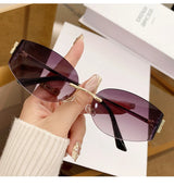 Oversized Rimless Oval Sunglasses – UV400 Metal Frame