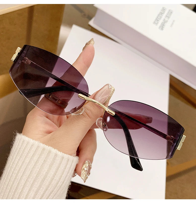 Oversized Rimless Oval Sunglasses – UV400 Metal Frame