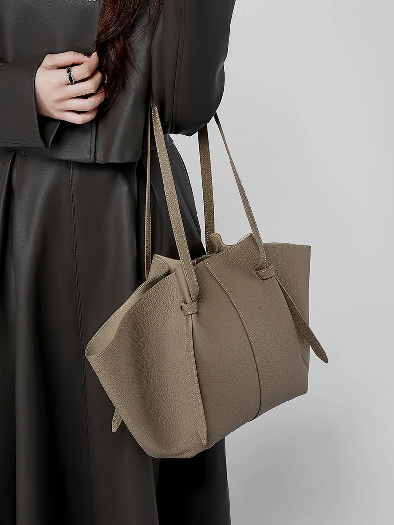 New Women's Large Capacity Cowhide Tote Fashionable Bat Wing Design Genuine Leather Handbag for Commuting Versatile Ladies Bag
