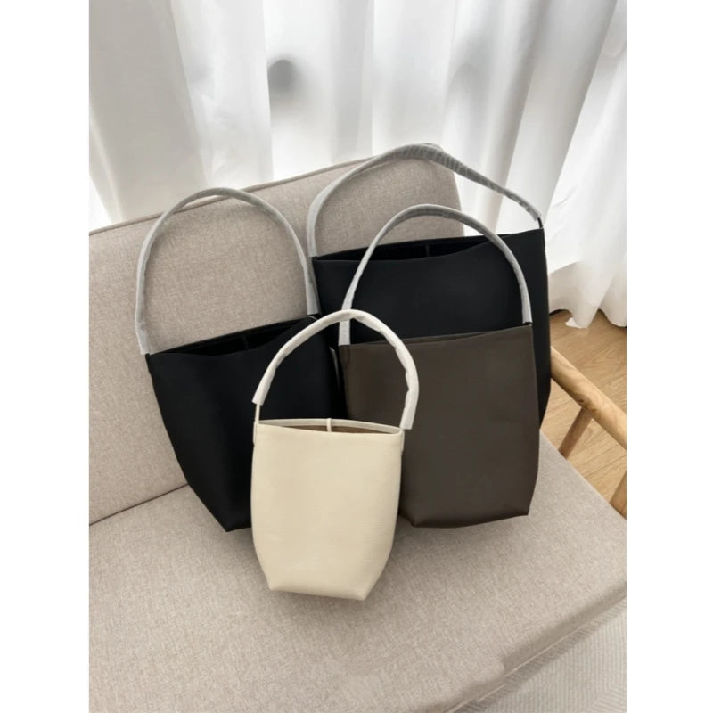 25 year new cowhide lychee pattern single shoulder commuting versatile large capacity bucket bag