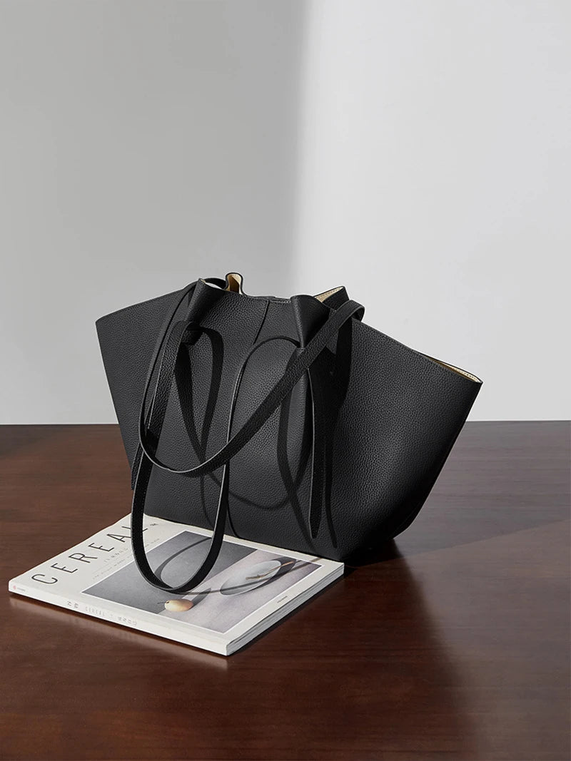 New Women's Large Capacity Cowhide Tote Fashionable Bat Wing Design Genuine Leather Handbag for Commuting Versatile Ladies Bag