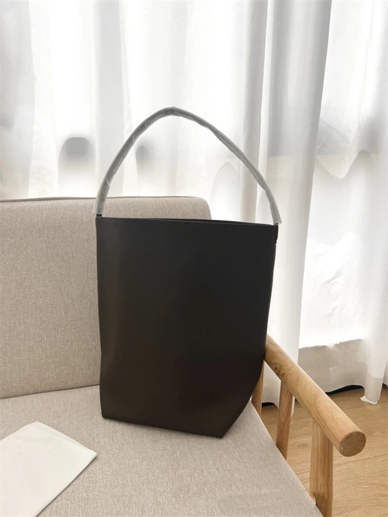 25 year new cowhide lychee pattern single shoulder commuting versatile large capacity bucket bag