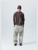 Mountain-Ready Crewneck: Engineered with Ribbed Neck, Reflective Logo, & Secure Chest Pocket for Outdoor Style Unisex